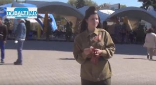 Русская община к 9 мая раздает Георгиевскую Ленту